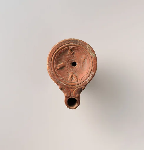 Terracotta oil lamp