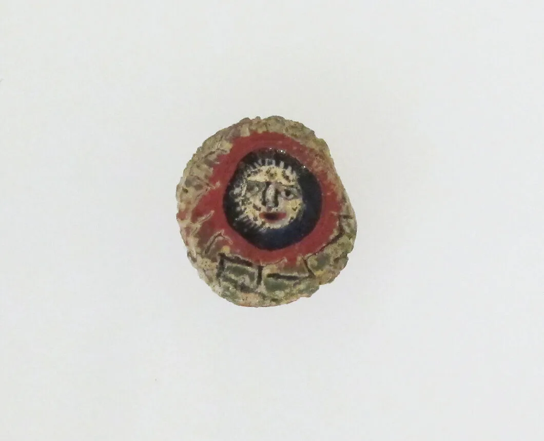 Glass mosaic face bead — Unknown