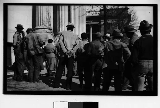 [Crowd in Public Square, from Behind]