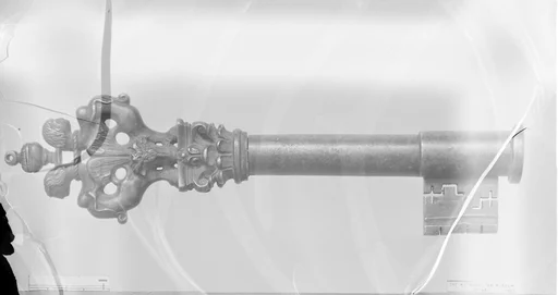 Key with removable sheath