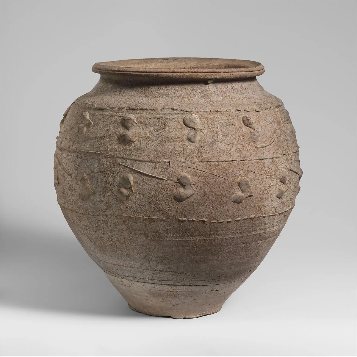 Terracotta jar with barbotine decoration — Unknown