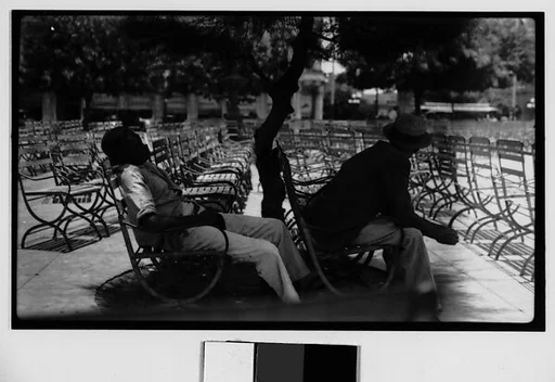 [Men Seated in Chairs in Public Park, Parque Fraternidad, Havana]