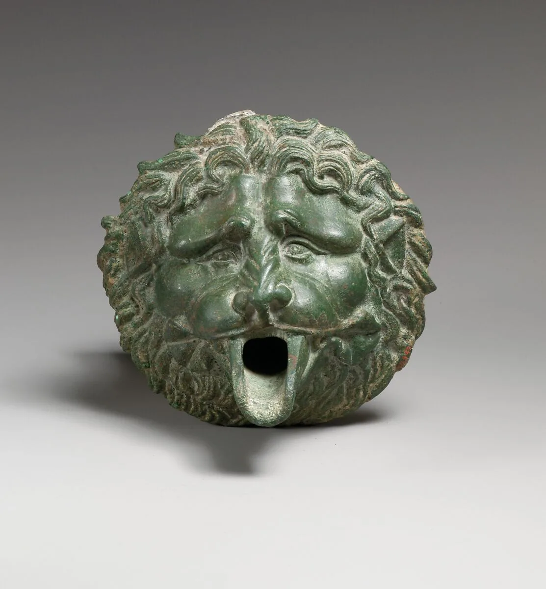 Bronze water spout in the form of a lion mask (one of a pair) — Unknown