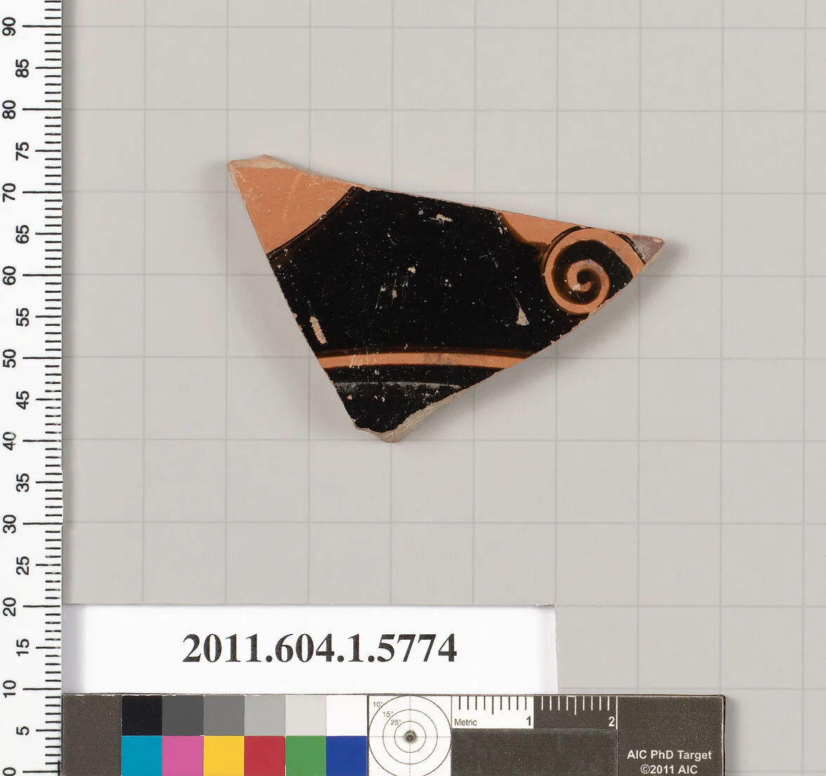 Terracotta fragment of a kylix: eye-cup (drinking cup) — Oltos