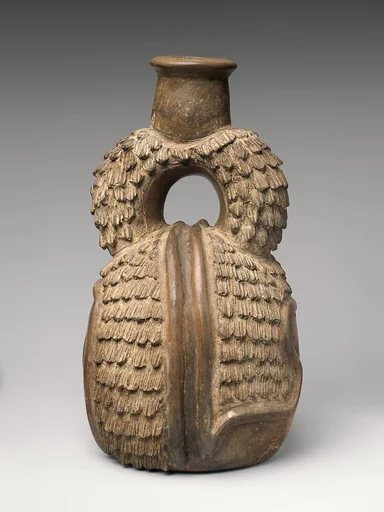 Stirrup-spout bottle