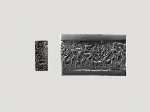 Cylinder seal and modern impression: hunter holding a lion; griffin attacking a stag; Master of Animals; double-headed eagle