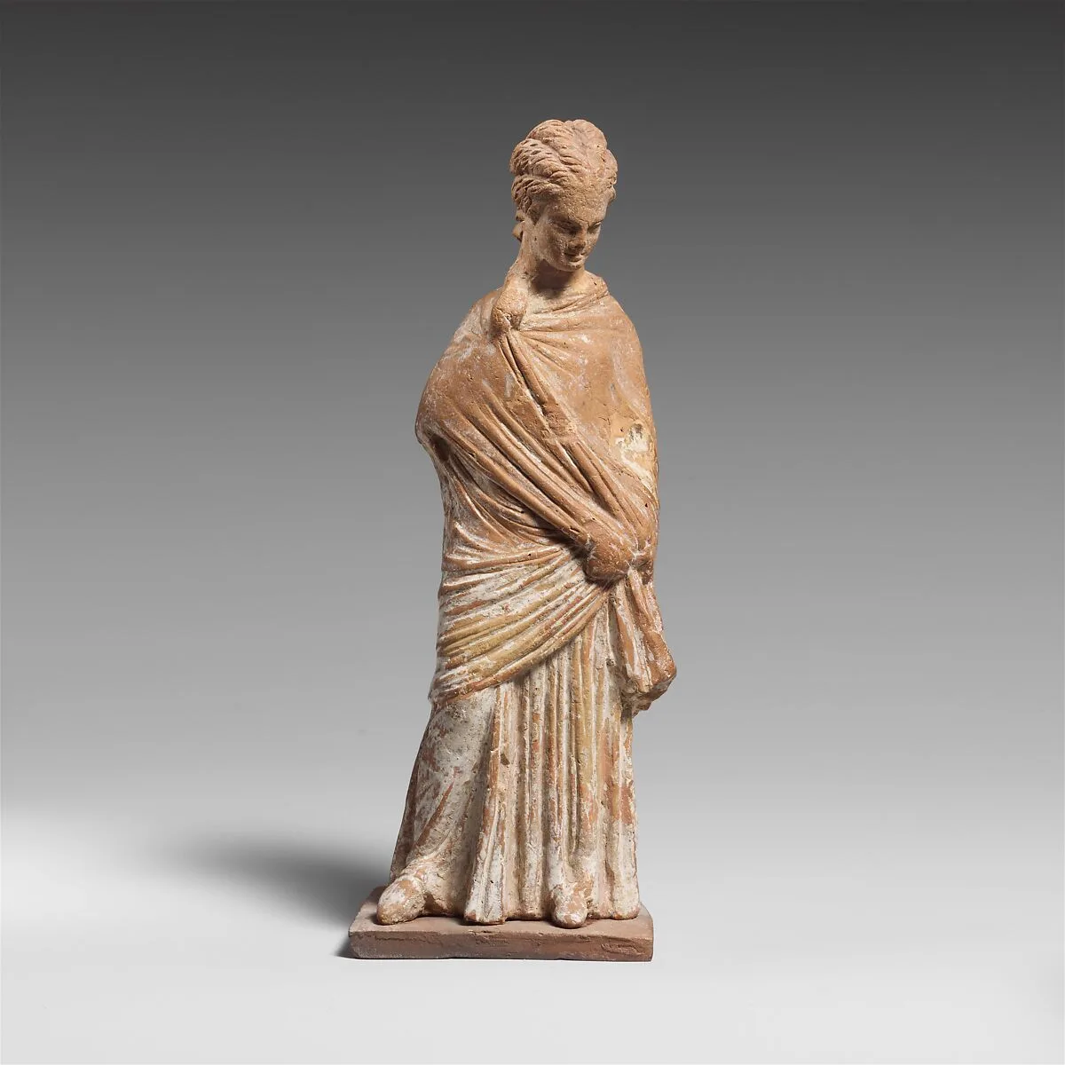 Terracotta statuette of a draped woman — Unknown