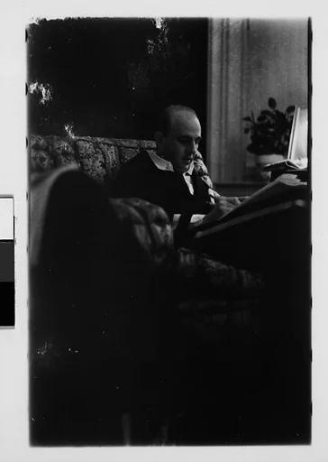 [Five 35mm Film Frames: Gifford Cochran and Unidentified Man in Library, Croton Falls, New York]