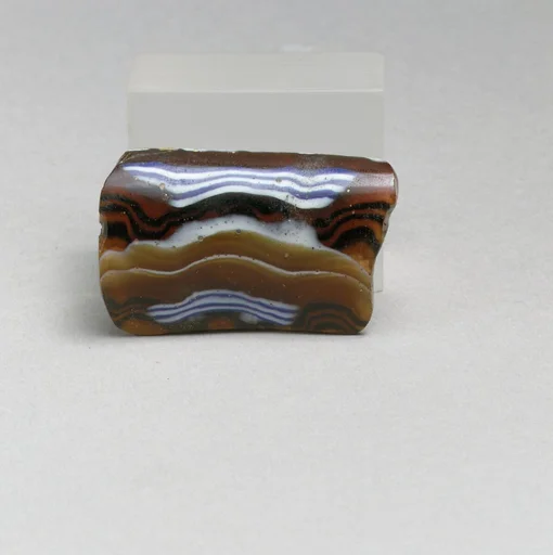 Glass mosaic ribbed bowl fragment