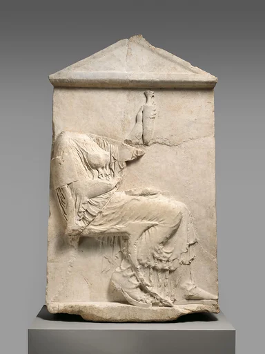 Marble grave stele of a woman
