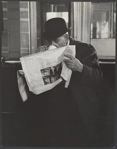 [Man in Bowler Hat Reading Newspaper and Drinking Tea, London]