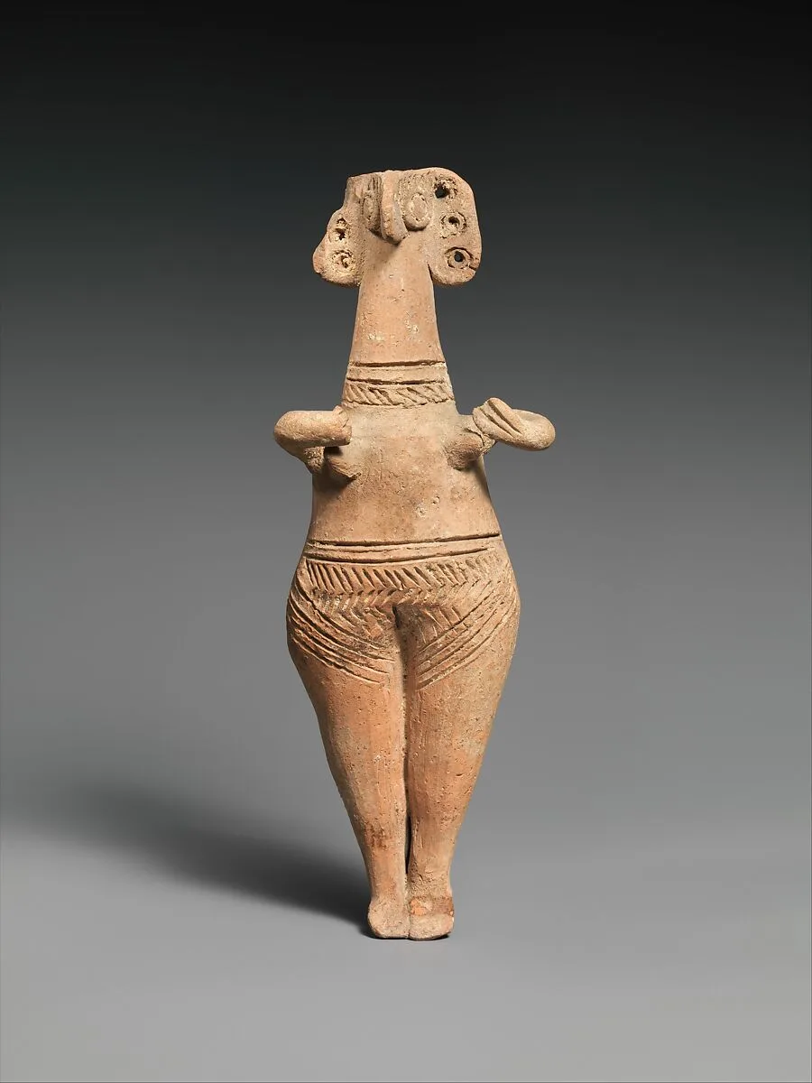 Terracotta statuette of woman with bird face — Unknown