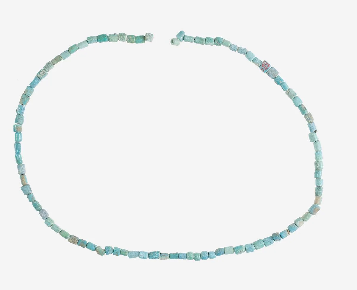 String of Short Cylindrical Beads — Unknown