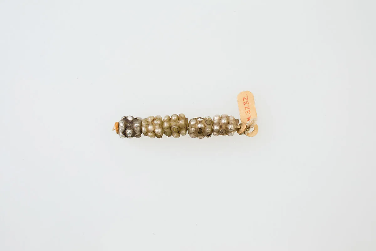 String of 5 knobbed beads — Unknown