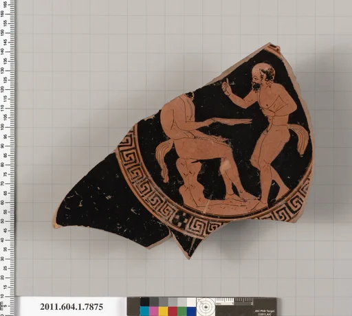 Terracotta fragment of a kylix (drinking cup)