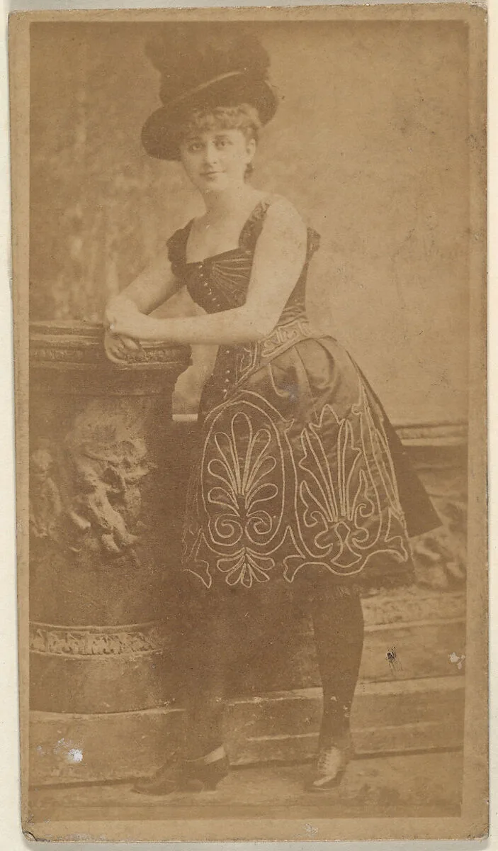 Actress wearing tall feathered hat, from the Actresses series (N668) — Unknown