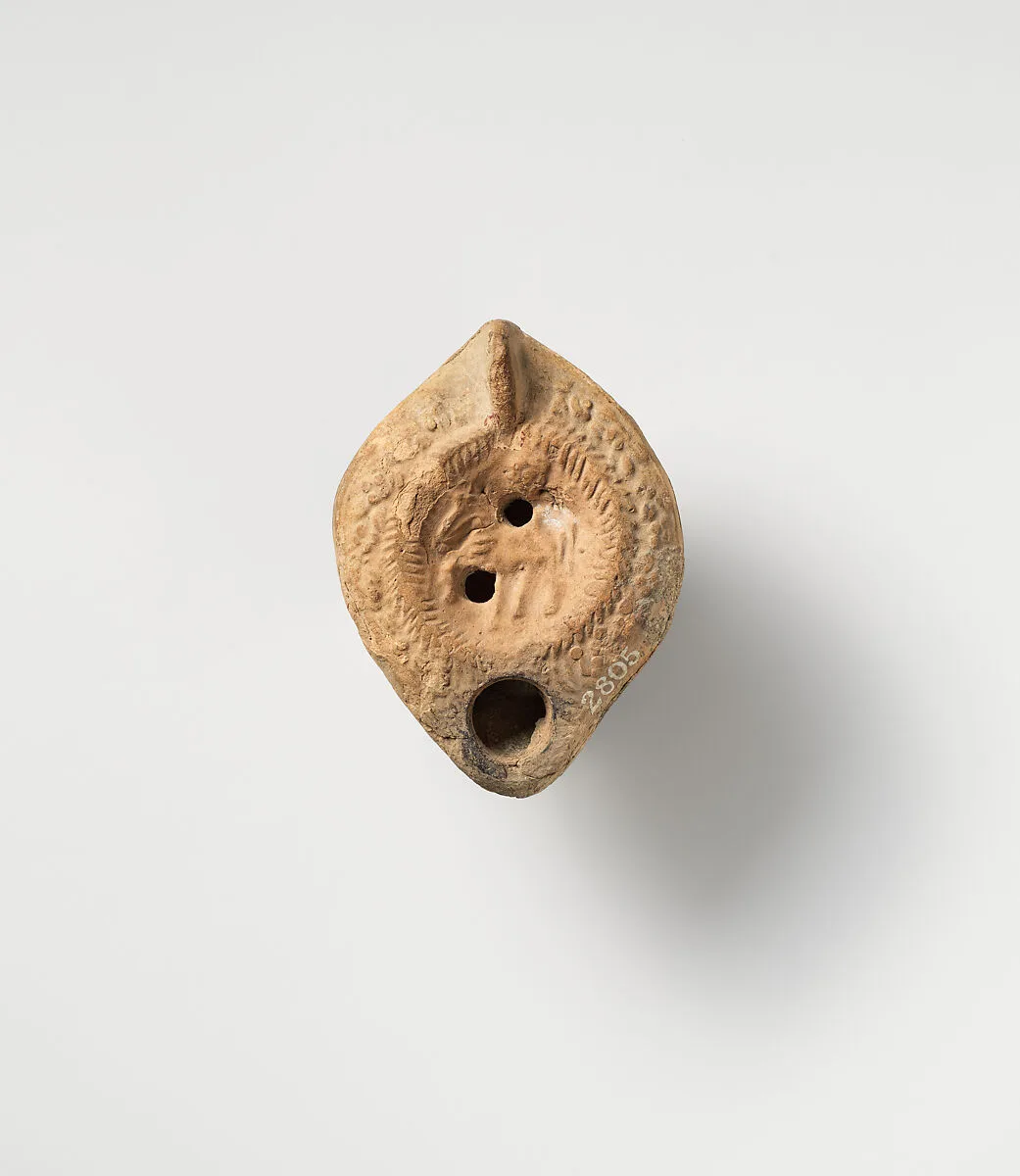 Terracotta oil lamp — Unknown