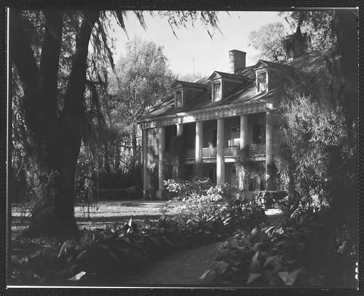 [Brick Greek Revival House with Ivy-Covered Columns, Residence of Weeks Hall, New Iberia, Louisiana]