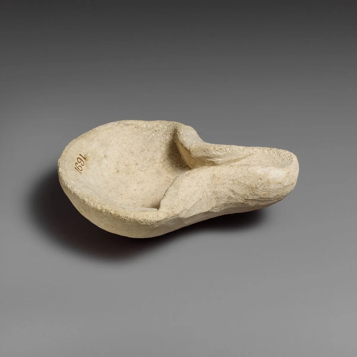Limestone saucer lamp — Unknown