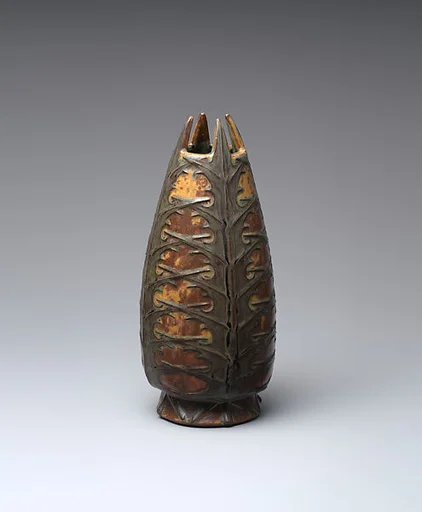 Vase with thistle leaves