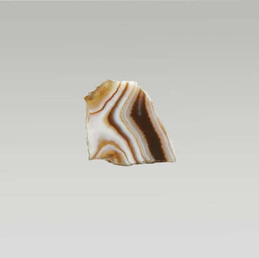 Banded agate inlay fragment