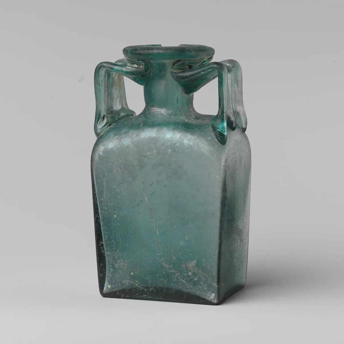 Glass rectangular bottle — Unknown