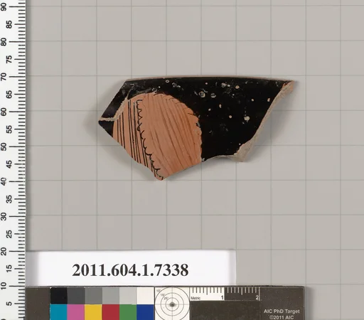 Terracotta rim fragment of a kylix (drinking cup)