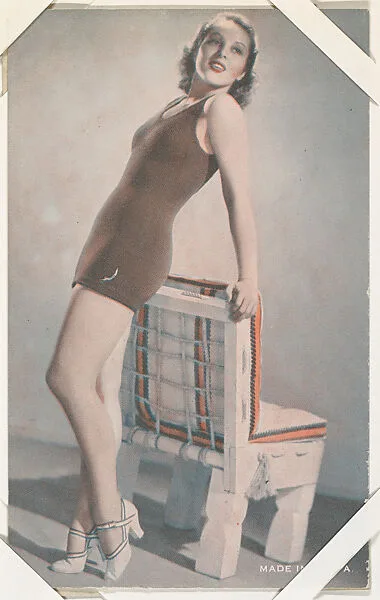 Actress leaning back on chair (W423) — Unknown