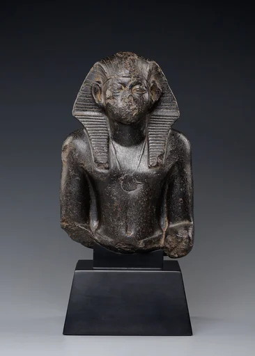 Upper Part of a Seated Statue of Pharaoh Senwosret III or Amenemhat III