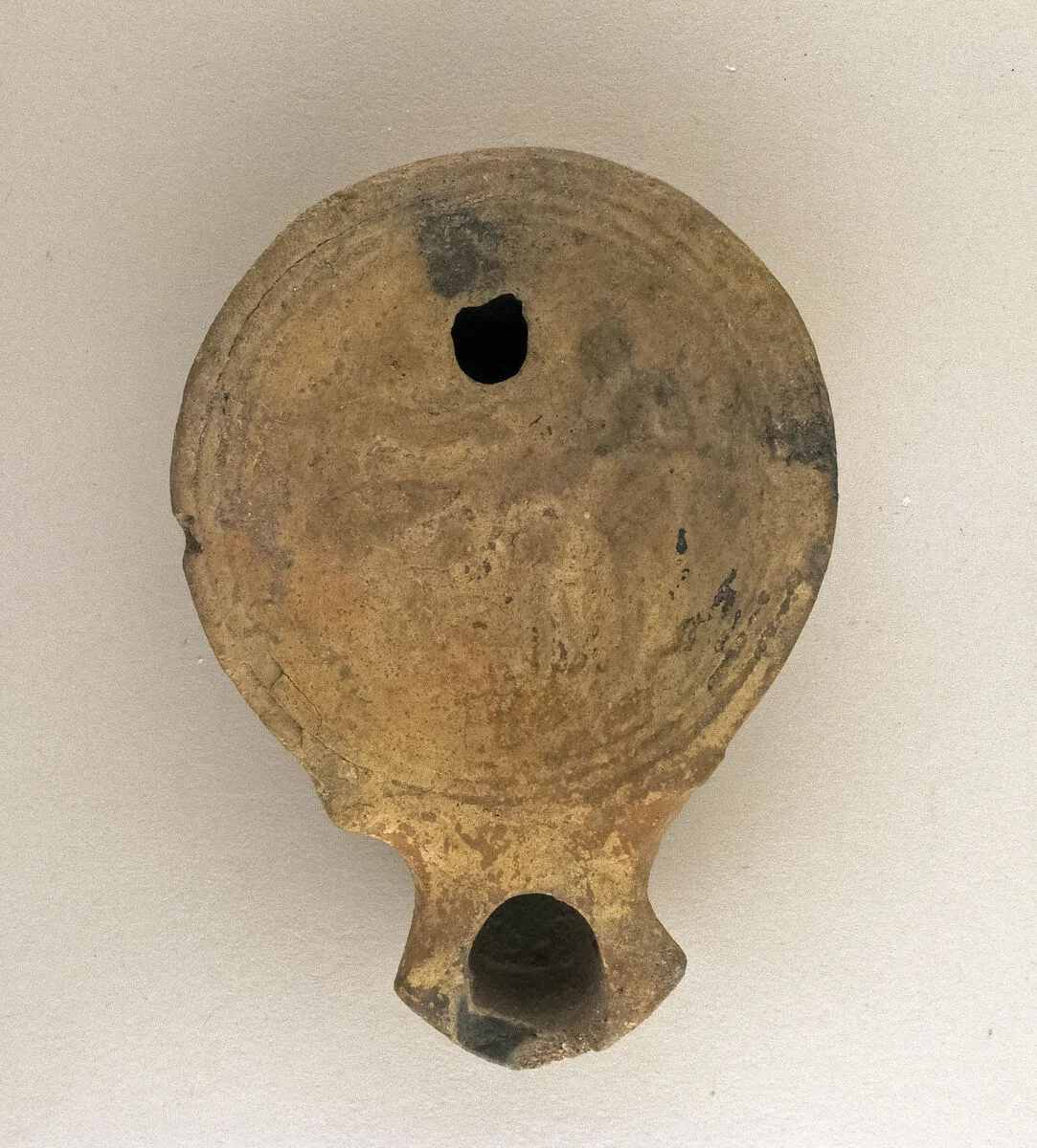 Terracotta oil lamp — Unknown