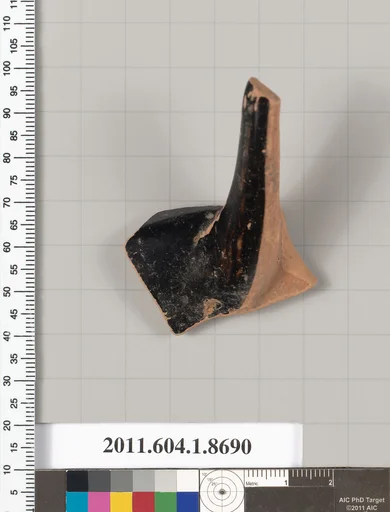 Terracotta fragment of a stemless kylix (drinking cup)