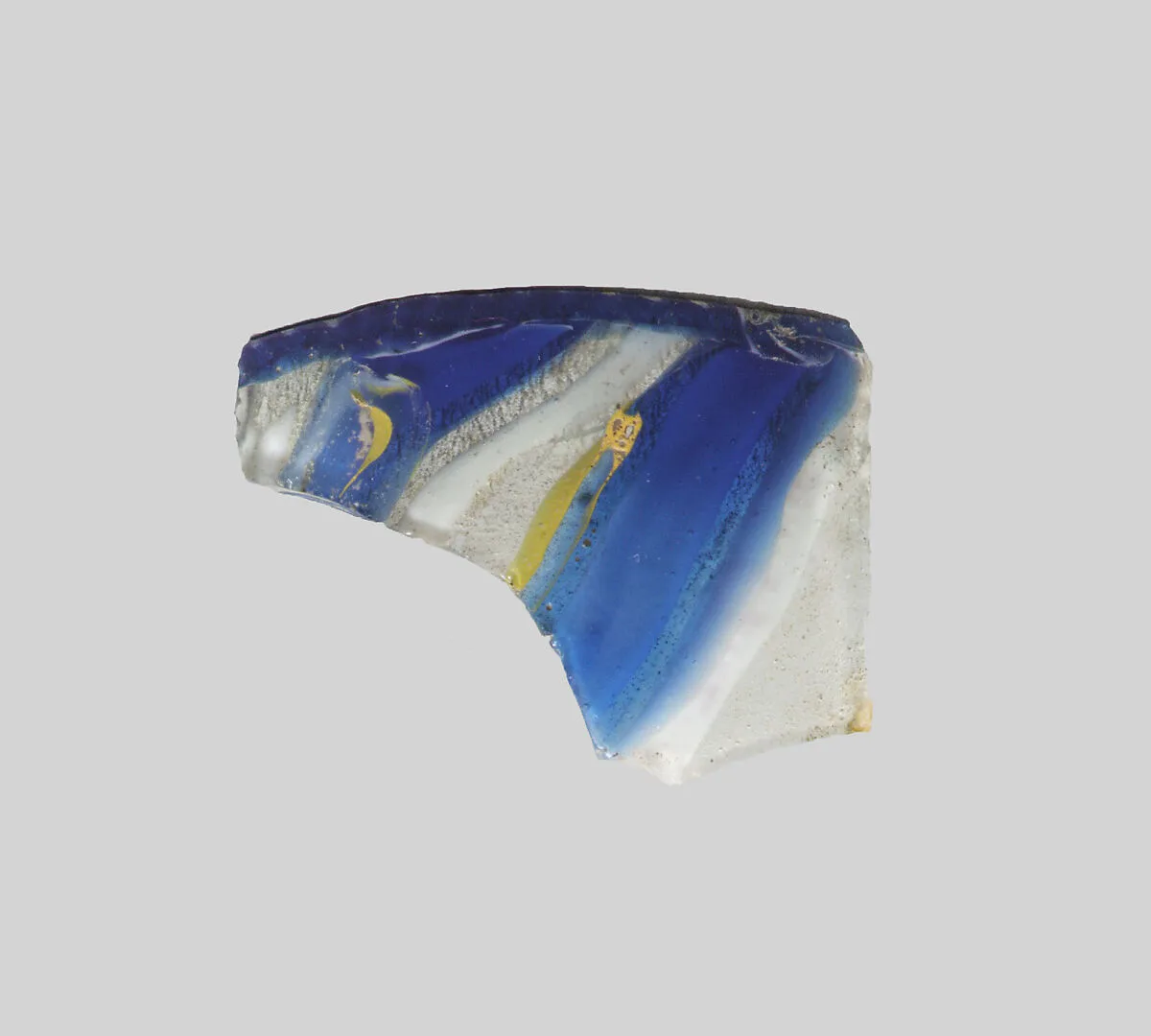 Glass striped mosaic bowl fragment — Unknown