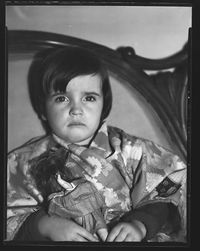 [Young Girl with Doll]