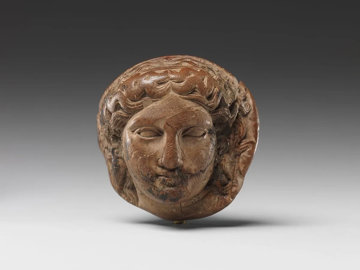 Head of Dionysus (?) for attachment, possibly for a couch — Unknown