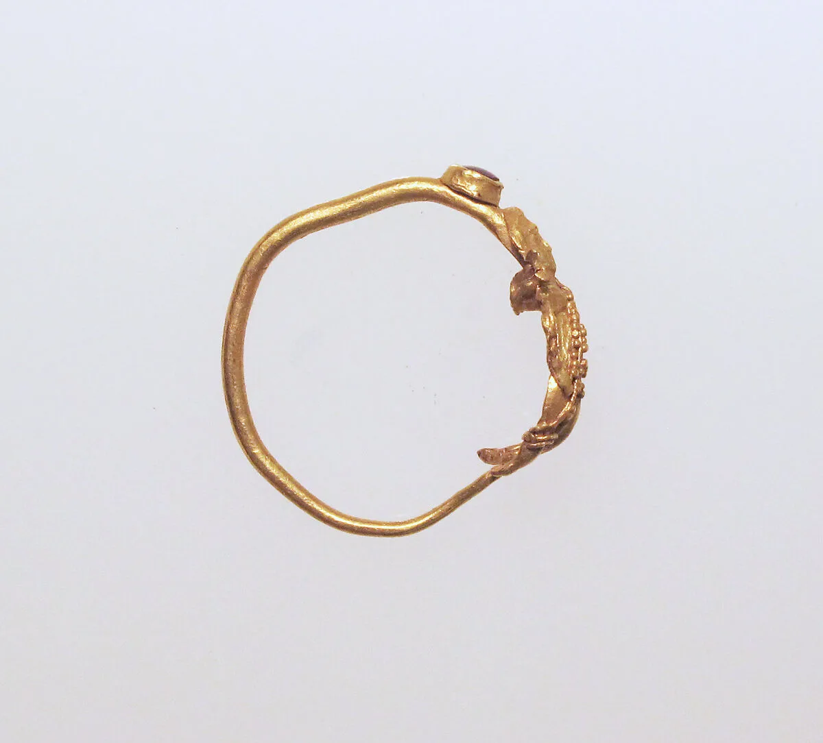 Earring with human figure — Unknown