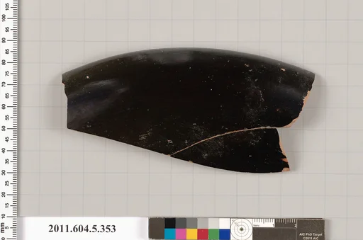 Terracotta rim fragment of a kylix (drinking cup)