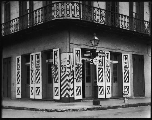 [French Quarter Barber Shop, Corner Toulouse and Dauphine Streets, New Orleans, Louisiana]