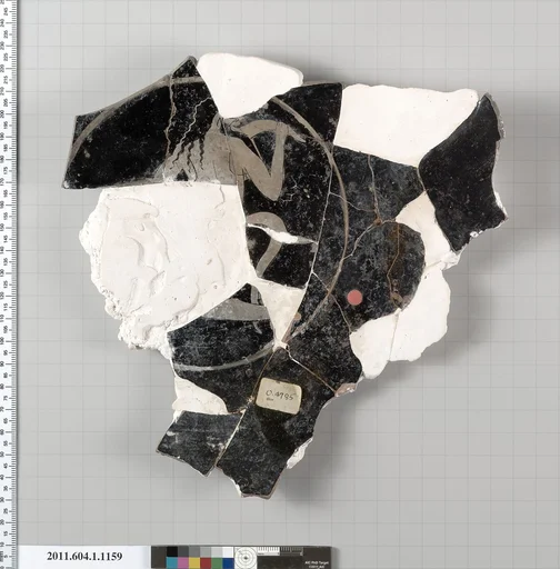 Terracotta fragment of a kylix (drinking cup)