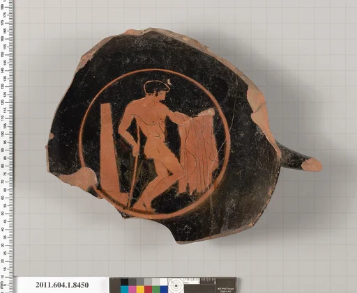 Terracotta fragment of a stemless kylix (drinking cup)