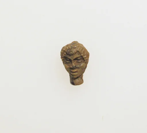 Glass pendant in the shape of a Black African's head