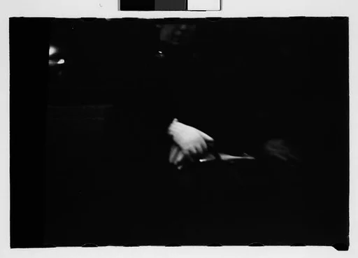 [Four 35mm Film Frames: Subway Passengers, New York City: Woman with Hands Folded in Lap, Two Women, One Reading Book, Woman Reading Book, Man Reading Newspaper, Man with Hands Folded in Lap]
