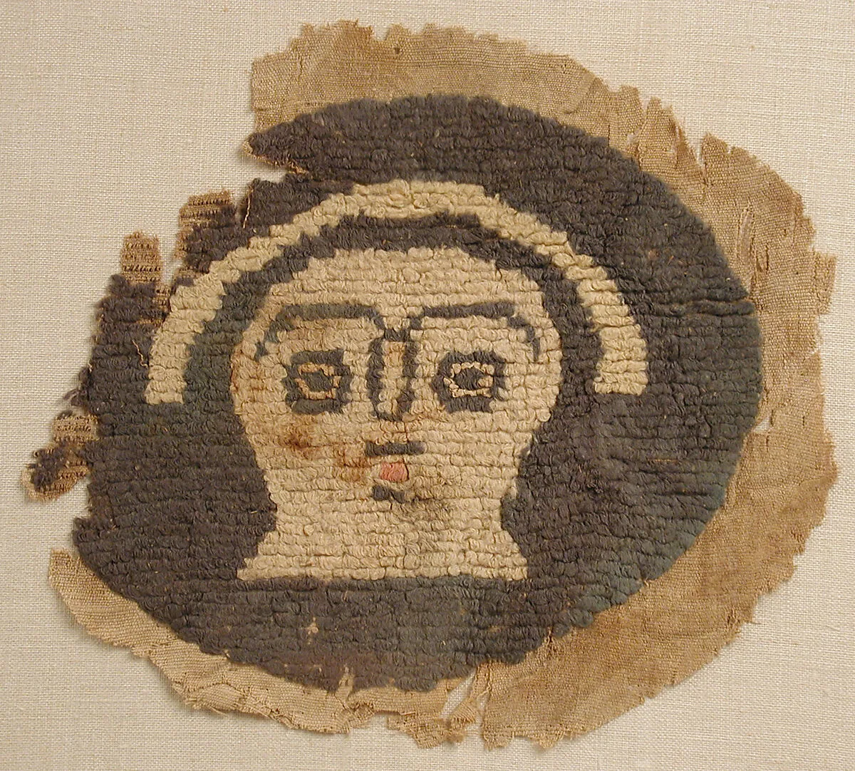 Roundel with Human Face — Unknown