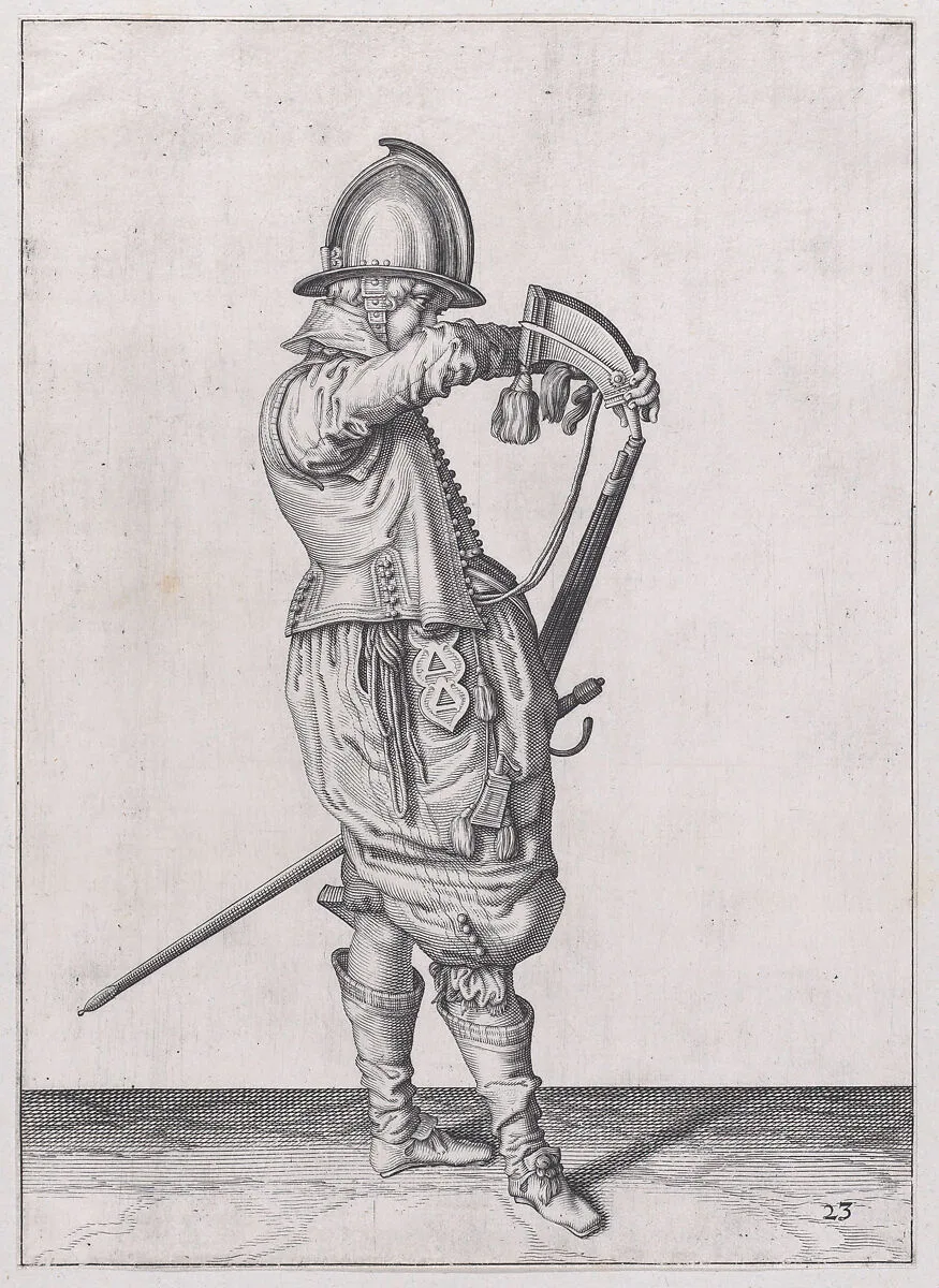A soldier charging his caliver which is held stock down, from the Marksmen series, plate 23, in Waffenhandlung von den Rören Musquetten undt Spiessen / Wapenhandelinghe van Roers Musquetten ende Spiessen (The Exercise of Arms) — Jacques de Gheyn II|Jacques de Gheyn II|Robert Willemsz de Baudous
