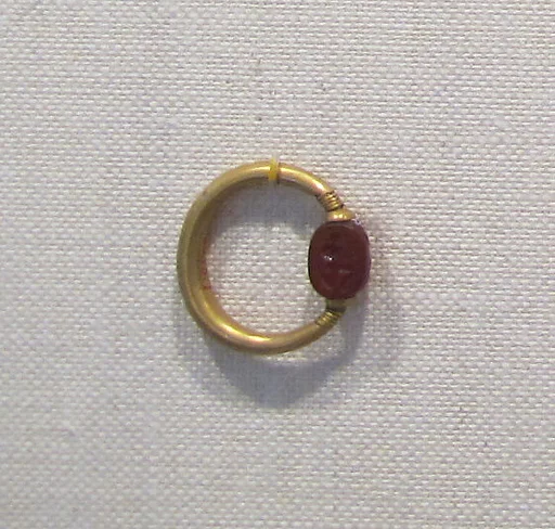 Gold swivel ring with carnelian scarab