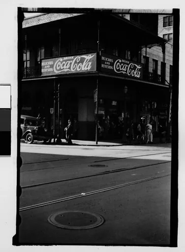 [Building with Coca-Cola Sign on Cast-Iron Balcony, Mobile, Alabama]