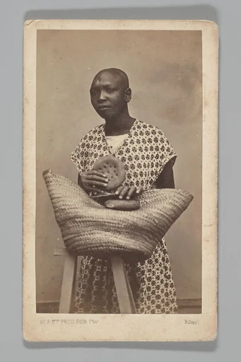 [Studio Portrait: Woman with Straw Basket, Algeria]