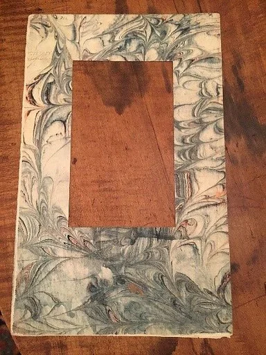 Folio Decorated with Marbling