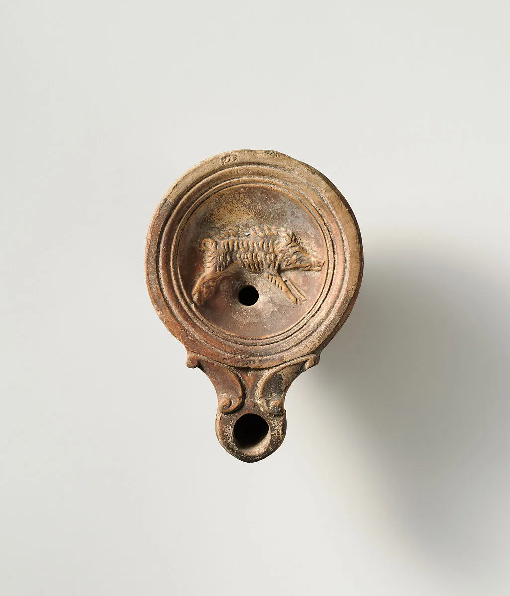 Terracotta oil lamp — Unknown