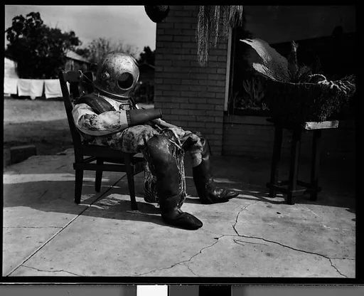 [Sponge Diver's Suit in Front of Mermaid Curio Shoppe, Florida]