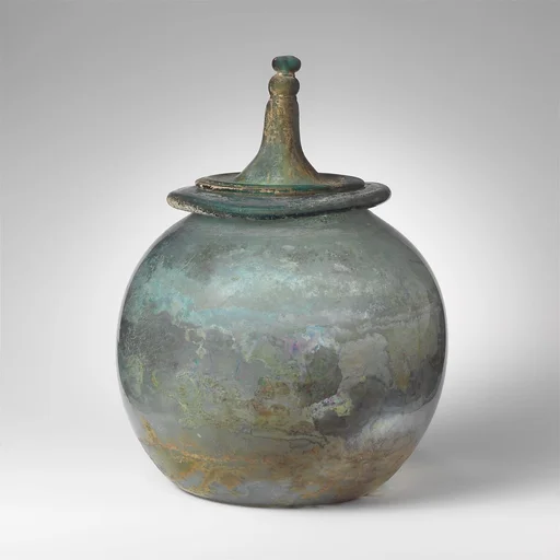 Glass cinerary urn with lid